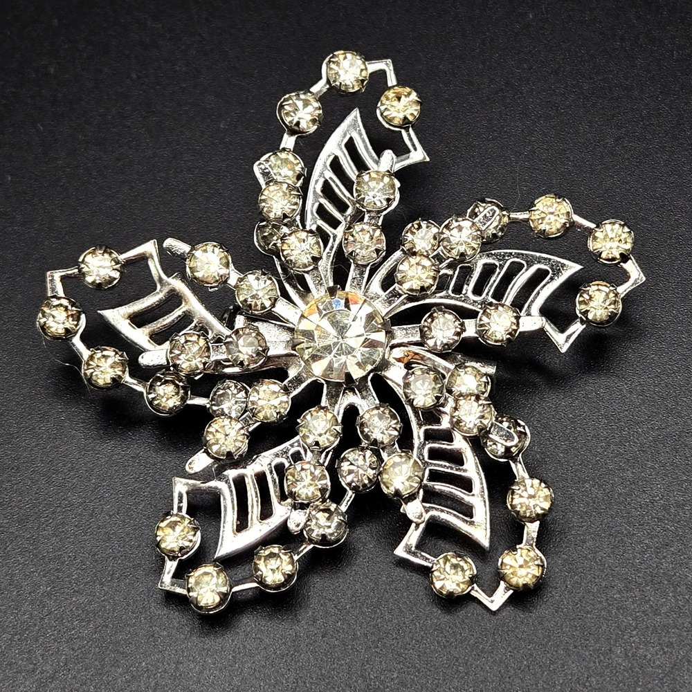 Vintage Silver Tone Rhinestone Pinwheel Starburst Brooch Pin Clear Stones